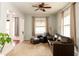 Inviting living room features plush carpeting, classic columns, and comfortable seating for relaxation at 616 N Bancroft St, Indianapolis, IN 46201