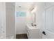 Bathroom features a vanity, mirror, and shower with curtain at 625 N Parker Ave, Indianapolis, IN 46201