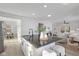 Spacious kitchen island with bar seating that opens to the sunny living room at 625 N Parker Ave, Indianapolis, IN 46201