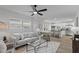 Bright and airy living room featuring an open layout to the modern kitchen at 625 N Parker Ave, Indianapolis, IN 46201
