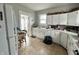 Bright kitchen featuring ample cabinet space and tile flooring at 640 W South St, Shelbyville, IN 46176