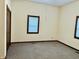 Bedroom featuring carpet flooring and natural light at 648 W South St, Shelbyville, IN 46176