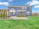 Backyard showcasing a well-maintained lawn, patio, and pergola, providing an ideal space for outdoor gatherings at 682 Keswick Dr, Brownsburg, IN 46112