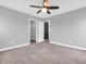 Neutral bedroom features carpet, ceiling fan, closet, and a light gray color at 682 Keswick Dr, Brownsburg, IN 46112