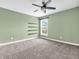 Bedroom has a single window, built-in shelves and neutral carpeting at 682 Keswick Dr, Brownsburg, IN 46112