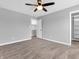 Bedroom features a ceiling fan, carpet and a walk-in closet at 682 Keswick Dr, Brownsburg, IN 46112