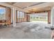Spacious unfinished garage with abundant natural light and ample room for vehicles and storage at 682 Keswick Dr, Brownsburg, IN 46112