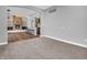 Open-concept space with fireplace, kitchen island, and seating, perfect for entertaining at 682 Keswick Dr, Brownsburg, IN 46112