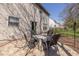 Backyard patio featuring an outdoor table and chair set for entertaining at 6853 Bretton Wood Dr, Indianapolis, IN 46268