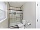 Updated bathroom featuring a new shower with updated shower and glass doors at 6853 Bretton Wood Dr, Indianapolis, IN 46268