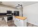 Beautiful kitchen featuring stainless steel appliances, white cabinets, and a butcher block island at 6853 Bretton Wood Dr, Indianapolis, IN 46268