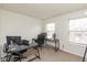 The office is bright and spacious with dual desks and lots of natural light at 6853 Bretton Wood Dr, Indianapolis, IN 46268