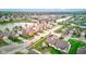 A lush neighborhood with well-maintained houses, flowering trees, and pristine lawns at 7150 Brant Pointe Cir, Indianapolis, IN 46217