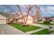 Beautiful residence showcasing a well-maintained lawn and mature trees at 7150 Brant Pointe Cir, Indianapolis, IN 46217