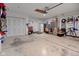 Well-organized garage featuring storage and coated concrete floors at 7150 Brant Pointe Cir, Indianapolis, IN 46217