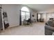 Open-concept space with home office featuring a large window at 7150 Brant Pointe Cir, Indianapolis, IN 46217
