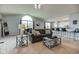 Open living area featuring neutral tones, large windows, and seamlessly connecting living spaces at 7150 Brant Pointe Cir, Indianapolis, IN 46217