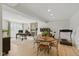 Spacious basement featuring a dining area, office space, fireplace, and fitness equipment at 7322 Franklin Parke Ct, Indianapolis, IN 46259