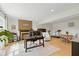 Finished basement with an office, fireplace, and seating area offers space for work and leisure at 7322 Franklin Parke Ct, Indianapolis, IN 46259