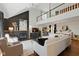 Bright living room with soaring ceilings, fireplace, and hardwood floors at 7322 Franklin Parke Ct, Indianapolis, IN 46259