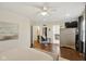 Large main bedroom with hardwood floors, ensuite bathroom access, and walk-in closet at 7322 Franklin Parke Ct, Indianapolis, IN 46259