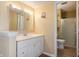 Bathroom with modern vanity, and a shower with glass doors at 745 W Banta Rd, Indianapolis, IN 46217