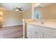Bathroom view towards vanity and across to bedroom at 745 W Banta Rd, Indianapolis, IN 46217