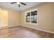 Inviting bedroom with a ceiling fan, hardwood floors and natural light from a window at 745 W Banta Rd, Indianapolis, IN 46217