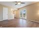 Spacious bedroom with sliding glass doors that lead to a private deck and yard at 745 W Banta Rd, Indianapolis, IN 46217