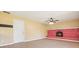 Living room with light hardwood floors and a decorative brick fireplace at 745 W Banta Rd, Indianapolis, IN 46217