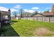 A spacious, fenced-in backyard with a grill and shed at 758 Stafford Rd, Plainfield, IN 46168