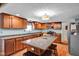 Spacious kitchen featuring a large center island, stainless steel appliances, granite countertops, and ample cabinet space at 758 Stafford Rd, Plainfield, IN 46168
