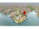 Idyllic lake community featuring cozy homes nestled on the waterfront, perfect for peaceful lakeside living and scenic views at 7591 Inkbush Dr, Nineveh, IN 46164