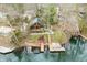 Beautiful lake house featuring a spacious deck, private dock, and stunning views of the surrounding lake and natural landscape at 7591 Inkbush Dr, Nineveh, IN 46164