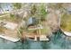 Beautiful lake house featuring a spacious deck, private dock, and stunning views of the surrounding lake and natural landscape at 7591 Inkbush Dr, Nineveh, IN 46164