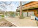 Waterfront log home with spacious patio perfect for relaxation and enjoying lake views at 7591 Inkbush Dr, Nineveh, IN 46164