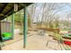 This home offers a sprawling concrete patio area for entertaining, surrounded by natural beauty at 7591 Inkbush Dr, Nineveh, IN 46164