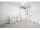 Bedroom with carpet, closet, and chairs at 7591 Inkbush Dr, Nineveh, IN 46164