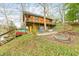 Log cabin with multiple decks offers stunning views of the surrounding natural landscape at 7591 Inkbush Dr, Nineveh, IN 46164