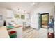 Charming kitchen featuring white cabinets, butcher block countertops, and an open doorway at 7591 Inkbush Dr, Nineveh, IN 46164