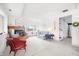 Cozy living room with a brick fireplace and comfortable seating arrangements at 7591 Inkbush Dr, Nineveh, IN 46164