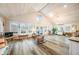 Bright and spacious living room with vaulted ceilings and lots of natural light at 7591 Inkbush Dr, Nineveh, IN 46164