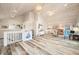 Bright and airy living room with vaulted ceilings, and wood floors perfect for entertaining and relaxing at 7591 Inkbush Dr, Nineveh, IN 46164