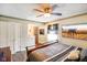 Bedroom featuring a ceiling fan, TV, and bathroom view at 7714 Kenneth Ct, Brownsburg, IN 46112