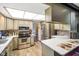 Modern kitchen featuring stainless steel appliances and white countertops at 7714 Kenneth Ct, Brownsburg, IN 46112