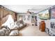 Spacious living room with recliner seating and movie-themed decor at 7714 Kenneth Ct, Brownsburg, IN 46112