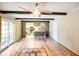 Open concept living room leading to a kitchen with modern appliances at 7714 Kenneth Ct, Brownsburg, IN 46112