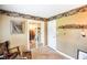 Cozy room featuring unique western decor, mirror closet, and natural light at 7714 Kenneth Ct, Brownsburg, IN 46112
