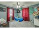 bedroom featuring plush carpet, car-shaped bed, and large window at 7764 S State Road 109, Markleville, IN 46056