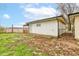 Exterior view of the garage featuring white siding and a well-maintained lawn at 7764 S State Road 109, Markleville, IN 46056